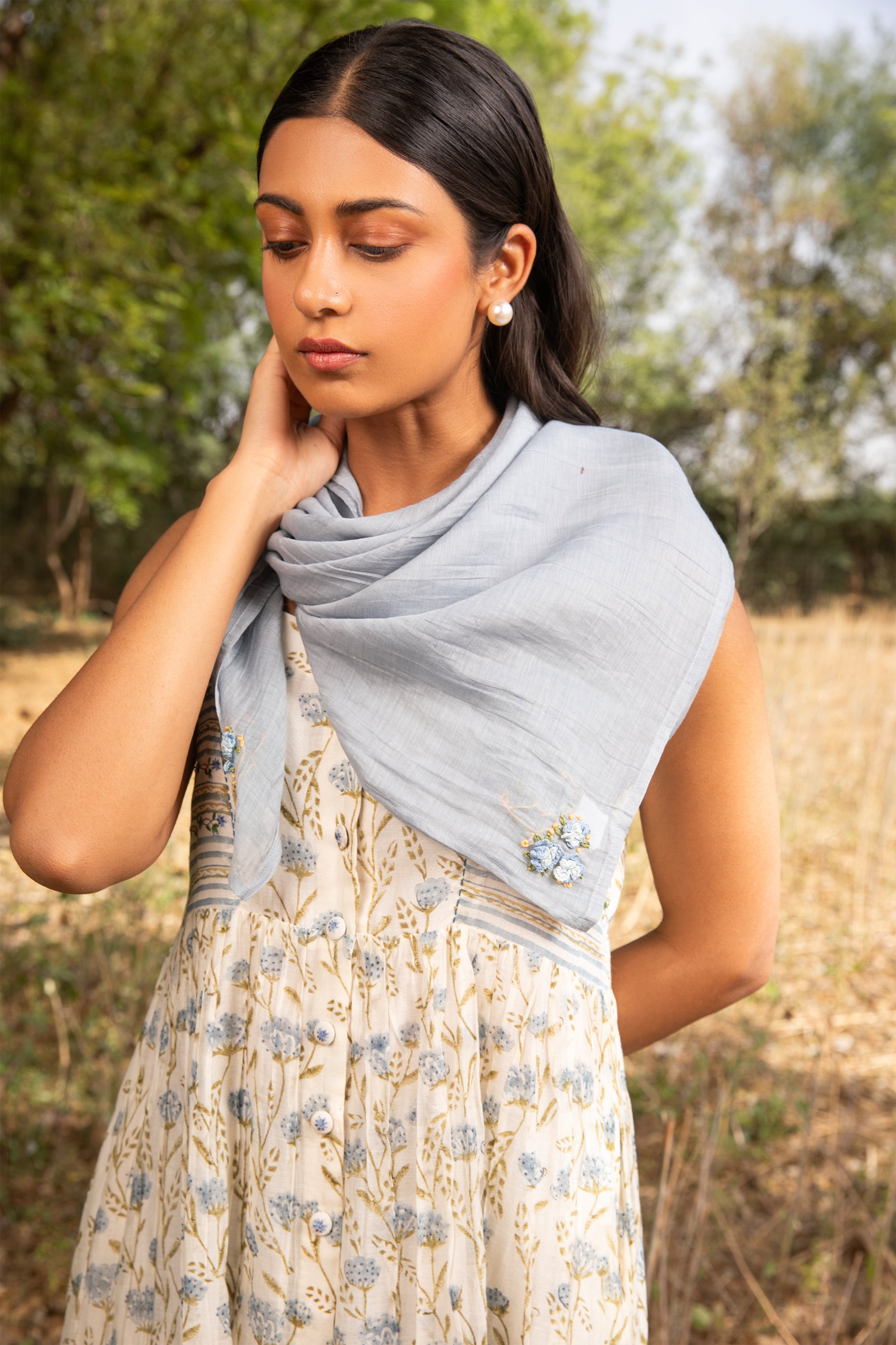 Sleeveless Dress in Off White with Sweetheart Neck and Subtle Embroidery