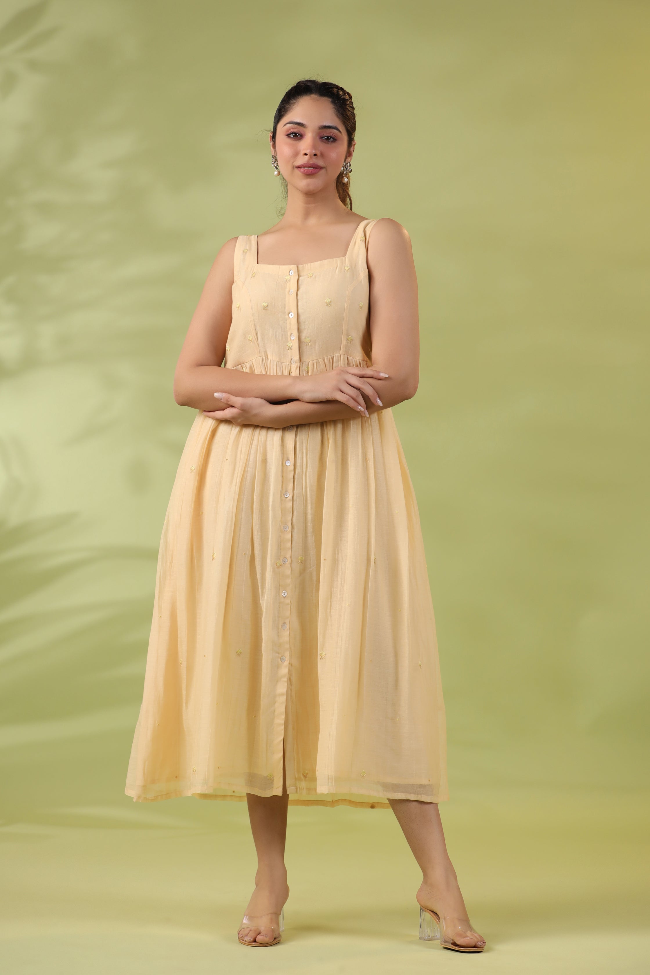 Amber Yellow Sleeveless Dress with Subtle Embroidery and Gathered Waist