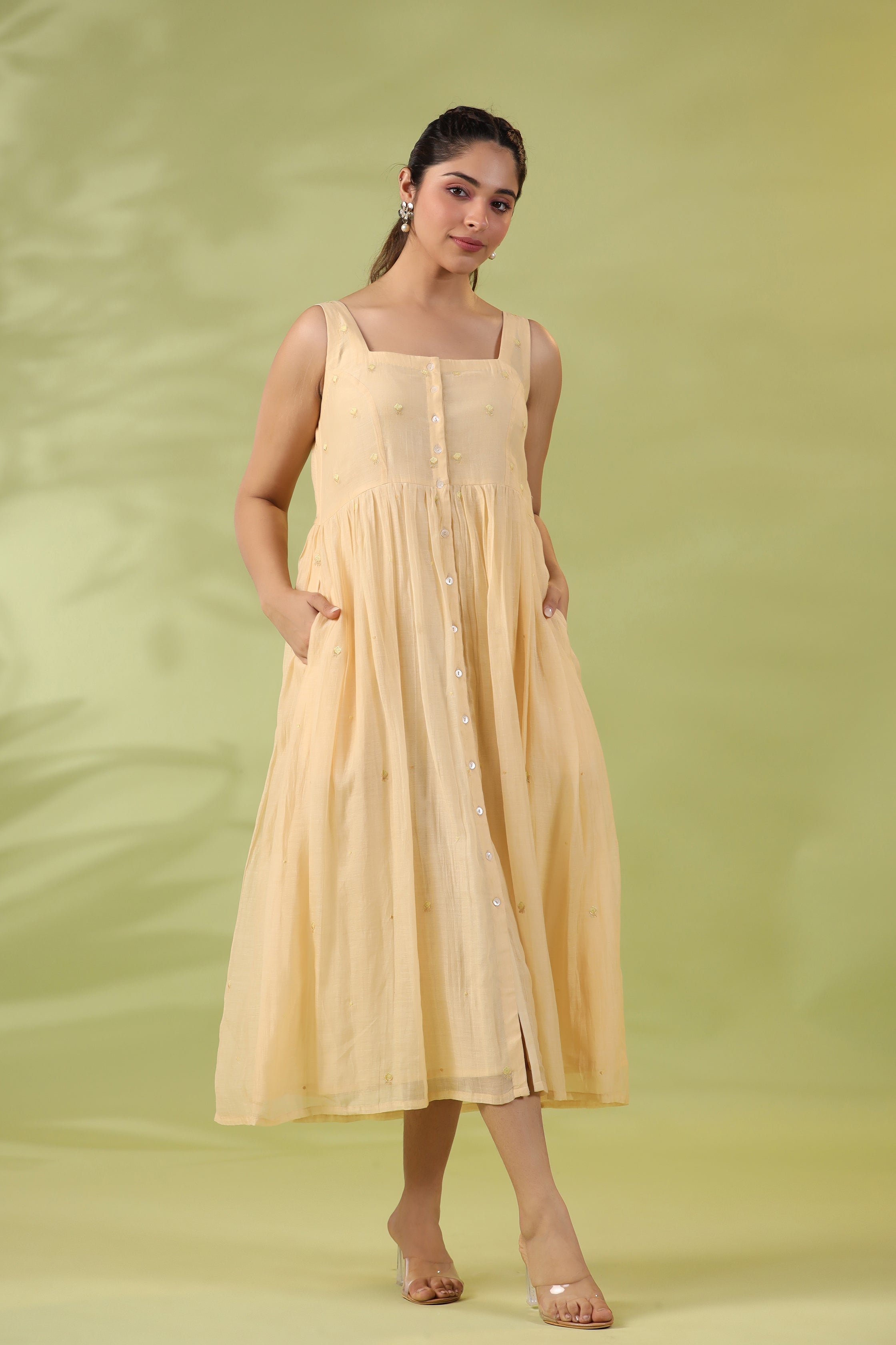 Amber Yellow Sleeveless Dress with Subtle Embroidery and Gathered Waist